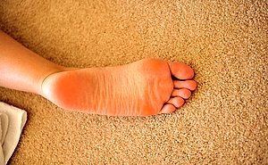 Lean blonde with an oozing mature pussy fucks herself with a purple toy